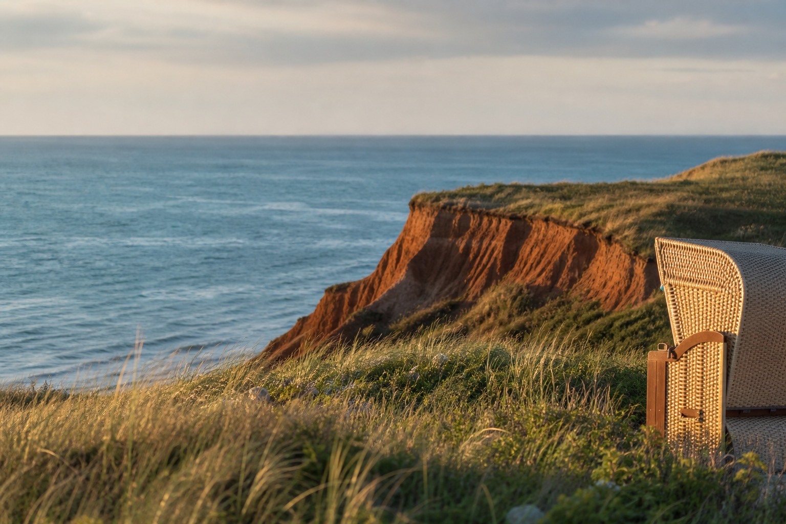 Sonnenuntergang Rotes Kliff Kampen + Strandkorb